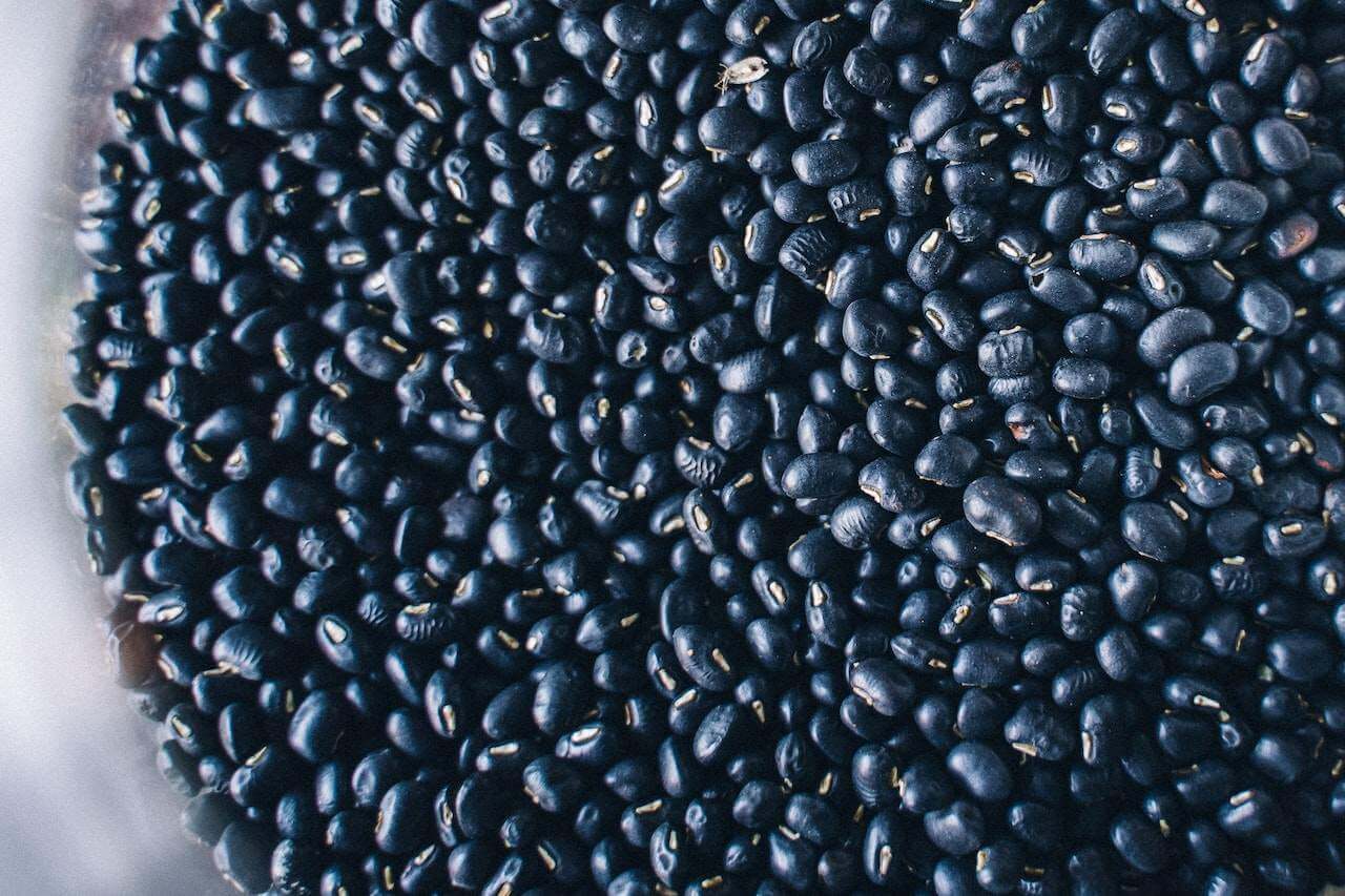 6541535f0166074c7f2e9753_close-up-of-black-beans-in-a-bowl